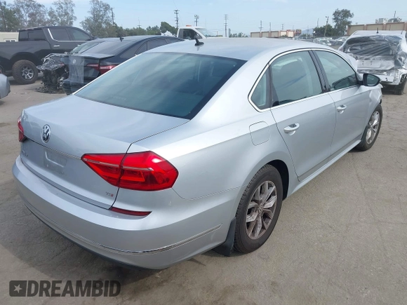 2016 Volkswagen Passat S with VIN 1VWAT7A32GC053916, listed as a IAAI auction lot 42288513 with 145,882 mi miles and . Bid and sale history available at DreamBid. Image 4.