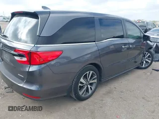 2022 Honda Odyssey Touring with VIN 5FNRL6H80NB023623, listed as a IAAI auction lot 41512586 with 63,329 mi miles and . Bid and sale history available at DreamBid. Image 4.