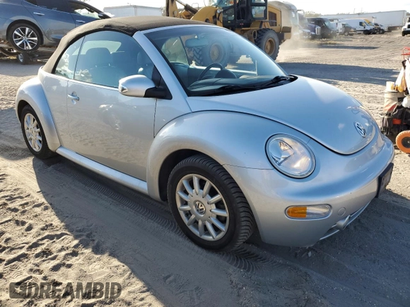 2004 Volkswagen Beetle with VIN 3VWCM21Y34M300701, listed as a Copart auction lot 77567344 with 91,236 mi miles and Salvage Title. Bid and sale history available at DreamBid. Image 4.