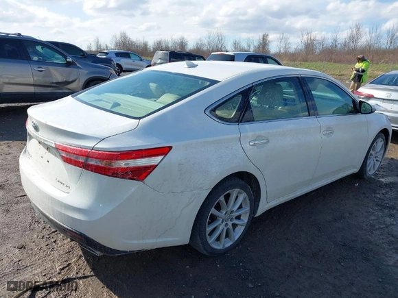 2013 Toyota Avalon XLE with VIN 4T1BK1EB4DU037825, listed as a IAAI auction lot 41963641 with 165,660 mi miles. Bid and sale history available at carsss.com. Image 4.