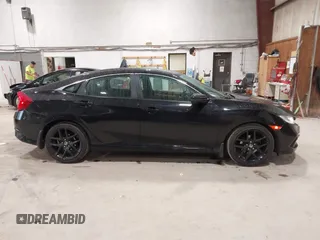 2019 Honda Civic Sport with VIN 2HGFC2F89KH557466, listed as a IAAI auction lot 42335216 with 138,747 mi miles and . Bid and sale history available at DreamBid. Image 13.