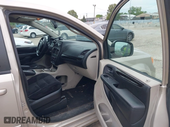 2014 Dodge Grand Caravan SXT z VIN 2C4RDGCG2ER372983, wystawiony jako IAAI lot #42369214 z przebiegiem 148 756 mil mil oraz . Historia ofert i sprzedaży dostępna na DreamBid. Obrazek 5.