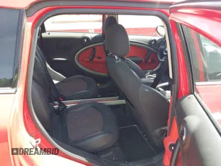 2012 MINI Countryman z VIN WMWZB3C50CWM03467, wystawiony jako IAAI lot #42318106 z przebiegiem 163 289 mil mil oraz . Historia ofert i sprzedaży dostępna na DreamBid. Obrazek 8.