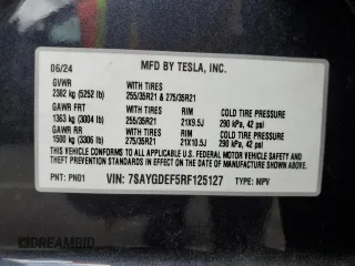 2024 Tesla Model Y Performance z VIN 7SAYGDEF5RF125127, wystawiony jako Copart lot #56753105 z przebiegiem 9 267 mil mil oraz Szkoda całkowita • Salvage title. Historia ofert i sprzedaży dostępna na DreamBid. Obrazek 13.