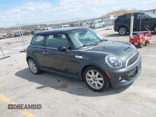 2013 MINI Hardtop S with VIN WMWSV3C59DT394005, listed as a IAAI auction lot 42028362 with 73,510 mi miles and . Bid and sale history available at DreamBid. Image 1.
