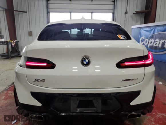 2023 BMW X4 xDrive30i with VIN 5UX33DT07P9P12954, listed as a Copart auction lot 42596275 with 27,590 mi miles and Salvage Title. Bid and sale history available at carsss.com. Image 6.