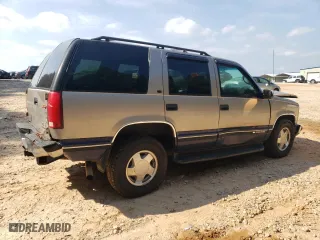 1999 Chevrolet Tahoe Z71 with VIN 1GNEK13R1XJ315188, listed as a Copart auction lot 68498944 with 264,880 mi miles and Salvage Title. Bid and sale history available at carsss.com. Image 3.