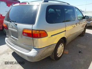2000 Toyota Sienna LE with VIN 4T3ZF13C9YU201789, listed as a IAAI auction lot 42641248 with 180,781 mi miles and . Bid and sale history available at DreamBid. Image 4.