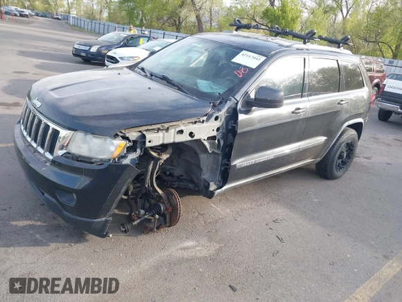 2011 Jeep Grand Cherokee 70th Anniversary with VIN 1J4RR4GG1BC588848, listed as a IAAI auction lot 42117042 with 168,273 mi miles. Bid and sale history available at carsss.com. Image 2.