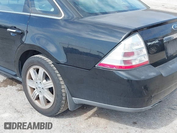 2008 Ford Taurus Limited with VIN 1FAHP28WX8G149284, listed as a IAAI auction lot 41530073 with 149,398 mi miles. Bid and sale history available at carsss.com. Image 13.