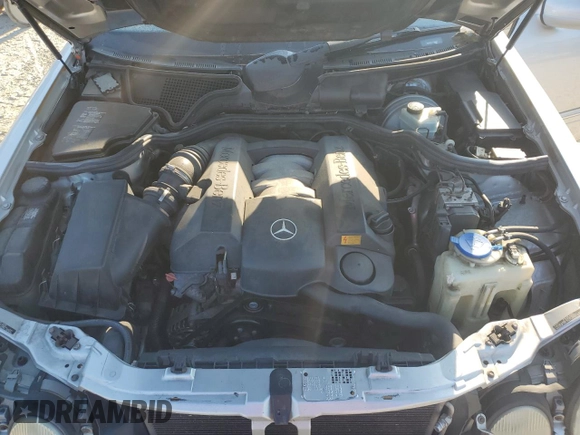 2000 Mercedes-Benz E-Class with VIN WDBJF65J3YB167247, listed as a Copart auction lot 75715464 with 0 mi miles and Salvage Title. Bid and sale history available at carsss.com. Image 11.
