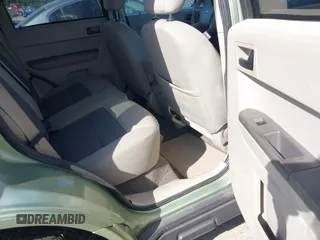 2008 Ford Escape Hybrid z VIN 1FMCU59H48KA68336, wystawiony jako IAAI lot #42083411 z przebiegiem 311 958 mil mil oraz . Historia ofert i sprzedaży dostępna na DreamBid. Obrazek 8.