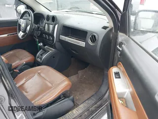 2014 Jeep Compass Limited with VIN 1C4NJDCB6ED549614, listed as a IAAI auction lot 41595768 with 114,472 mi miles. Bid and sale history available at carsss.com. Image 5.