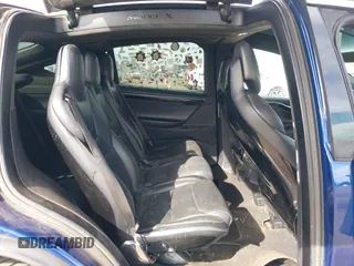 2016 Tesla Model X 70D z VIN 5YJXCAE29GF015890, wystawiony jako IAAI lot #41637564 z przebiegiem 145 848 mil mil oraz . Historia ofert i sprzedaży dostępna na DreamBid. Obrazek 8.