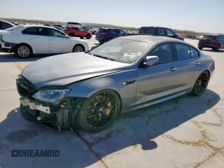 2015 BMW M6 z VIN WBS6C9C56FD467608, wystawiony jako Copart lot #49823385 z przebiegiem 67 748 mil mil oraz Tytuł czysty. Historia ofert i sprzedaży dostępna na DreamBid. Obrazek 1.