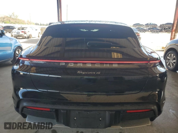 2022 Porsche Taycan 4 z VIN WP0BA2Y11NSA67171, wystawiony jako Copart lot #59885844 z przebiegiem 22 760 mil mil oraz Szkoda całkowita • Salvage title. Historia ofert i sprzedaży dostępna na DreamBid. Obrazek 6.