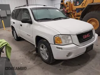 2004 GMC Envoy SLE with VIN 1GKDT13S042173138, listed as a IAAI auction lot 41340595 with 111,282 mi miles. Bid and sale history available at carsss.com. Image 1.