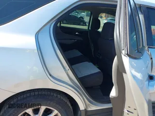 2018 Chevrolet Equinox LS with VIN 3GNAXHEV8JS502212, listed as a IAAI auction lot 42064863 with 107,321 mi miles and . Bid and sale history available at DreamBid. Image 8.