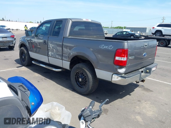 2005 Ford F-150 XLT with VIN 1FTPX14545KC86498, listed as a IAAI auction lot 42045892 with 253,760 mi miles. Bid and sale history available at carsss.com. Image 3.