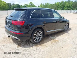 2017 Audi Q7 Premium Plus z VIN WA1LHAF7XHD040259, wystawiony jako IAAI lot #42286217 z przebiegiem 141 030 mil mil oraz . Historia ofert i sprzedaży dostępna na DreamBid. Obrazek 4.