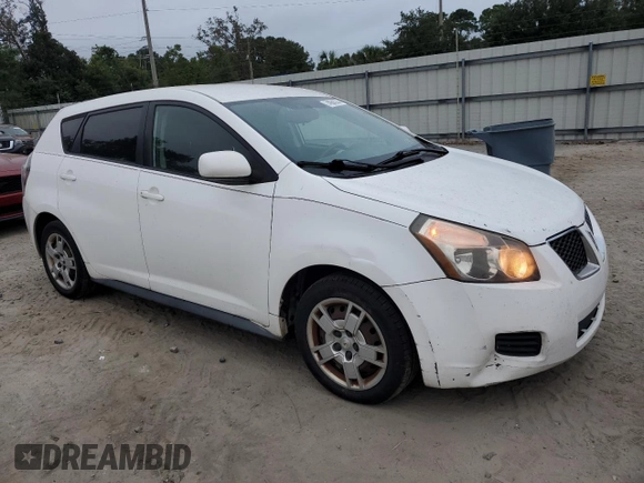 2009 Pontiac Vibe w/1SB with VIN 5Y2SP67039Z426853, listed as a Copart auction lot 74064324 with 97,445 mi miles and Salvage Title. Bid and sale history available at carsss.com. Image 4.