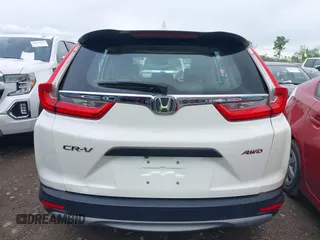 2018 Honda CR-V LX z VIN 2HKRW6H37JH215564, wystawiony jako IAAI lot #42191977 z przebiegiem 90 994 mil mil oraz . Historia ofert i sprzedaży dostępna na DreamBid. Obrazek 16.