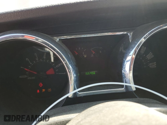 2009 Ford Mustang with VIN 1ZVHT84N895112458, listed as a Copart auction lot 52880595 with 166,456 mi miles and Salvage title. Bid and sale history available at DreamBid. Image 9.