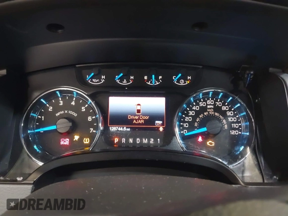 2014 Ford F-150 XL with VIN 1FTFX1ET8EKE32412, listed as a IAAI auction lot 41557331 with 128,744 mi miles. Bid and sale history available at carsss.com. Image 7.
