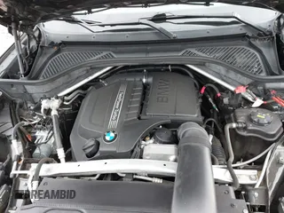 2015 BMW X6 xDrive35i z VIN 5UXKU2C56F0N76862, wystawiony jako IAAI lot #41747776 z przebiegiem 119 426 mil mil oraz . Historia ofert i sprzedaży dostępna na DreamBid. Obrazek 10.