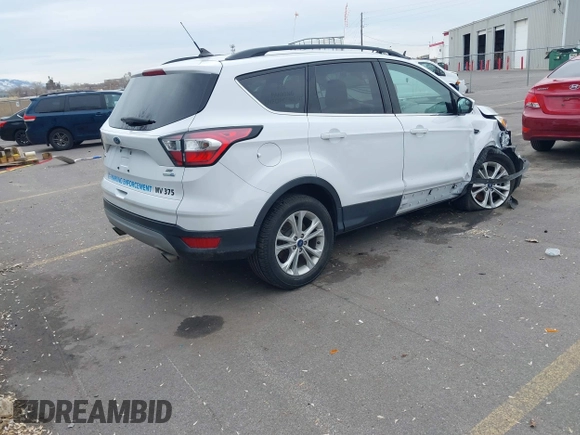 2018 Ford Escape SE z VIN 1FMCU9GD0JUC62783, wystawiony jako IAAI lot #41488153 z przebiegiem 55 774 mil mil oraz . Historia ofert i sprzedaży dostępna na DreamBid. Obrazek 4.