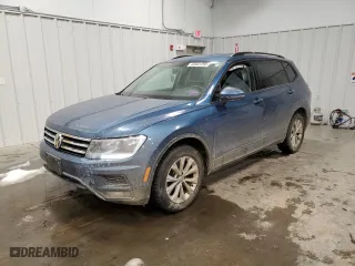 2018 Volkswagen Tiguan S with VIN 3VV0B7AX9JM034033, listed as a Copart auction lot 43441295 with 127,719 mi miles and Salvage Title. Bid and sale history available at carsss.com. Image 1.