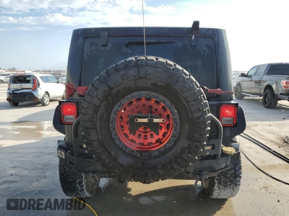 2018 Jeep Wrangler JK Unlimited Sport S with VIN 1C4BJWDG8JL812324, listed as a Copart auction lot 76595354 with 140,013 mi miles and Salvage Title. Bid and sale history available at carsss.com. Image 6.