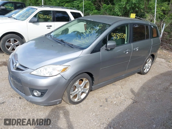 2010 Mazda 5 Sport with VIN JM1CR2W31A0384307, listed as a IAAI auction lot 42305589 with 144,372 mi miles and . Bid and sale history available at DreamBid. Image 2.