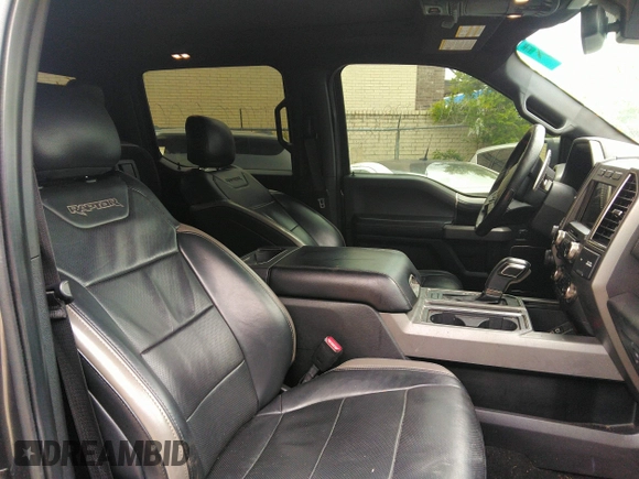 2017 Ford F-150 Raptor with VIN 1FTFW1RG8HFA31164, listed as a IAAI auction lot 42125542 with 164,745 mi miles and . Bid and sale history available at carsss.com. Image 5.