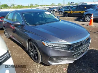 2021 Honda Accord Touring with VIN 1HGCV3F96MA018350, listed as a IAAI auction lot 42126137 with 73,617 mi miles and . Bid and sale history available at DreamBid. Image 1.