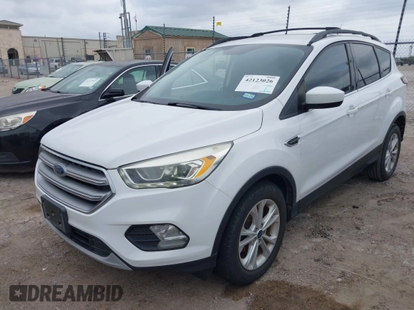 2017 Ford Escape SE with VIN 1FMCU0GD0HUD19621, listed as a IAAI auction lot 42123026 with 105,664 mi miles and . Bid and sale history available at carsss.com. Image 2.