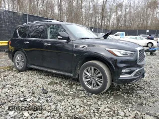 2019 Infiniti QX80 LUXE with VIN JN8AZ2NF6K9687748, listed as a Copart auction lot 45217745 with 123,319 mi miles and Salvage Title. Bid and sale history available at carsss.com. Image 4.