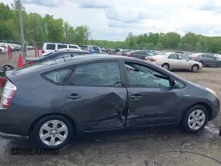 2007 Toyota Prius with VIN JTDKB20U573284607, listed as a IAAI auction lot 42099736 with 243,976 mi miles. Bid and sale history available at carsss.com. Image 13.