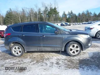 2016 Ford Escape SE with VIN 1FMCU9GX1GUC32307, listed as a IAAI auction lot 41395399 with 142,664 mi miles. Bid and sale history available at carsss.com. Image 13.