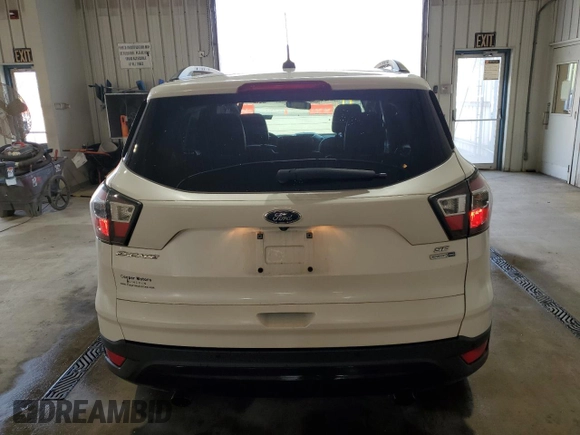 2017 Ford Escape SE with VIN 1FMCU9GD8HUA02240, listed as a Copart auction lot 55027345 with 75,468 mi miles and Salvage Title. Bid and sale history available at DreamBid. Image 6.