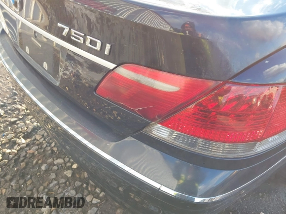 2008 BMW 7 Series 750i with VIN WBAHL83548DT14414, listed as a IAAI auction lot 41385596 with 153,303 mi miles and . Bid and sale history available at DreamBid. Image 6.