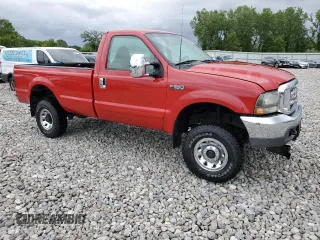 2001 Ford F-350 with VIN 3FTSF31S11MA04310, listed as a Copart auction lot 61232955 with 109,387 mi miles and Salvage title. Bid and sale history available at DreamBid. Image 4.