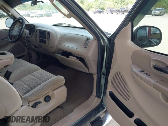 2002 Ford F-150 XL with VIN 2FTRX07L82CA55701, listed as a IAAI auction lot 41966222 with 103,226 mi miles and . Bid and sale history available at DreamBid. Image 5.
