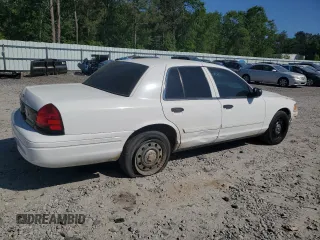 2010 Ford Police Interceptor with VIN 2FABP7BV7AX140870, listed as a Copart auction lot 53457275 with 124,194 mi miles and Salvage title. Bid and sale history available at DreamBid. Image 3.