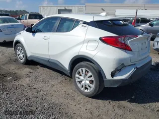 2021 Toyota C-HR LE with VIN NMTKHMBX3MR133551, listed as a IAAI auction lot 41472613 with 50,995 mi miles. Bid and sale history available at carsss.com. Image 3.