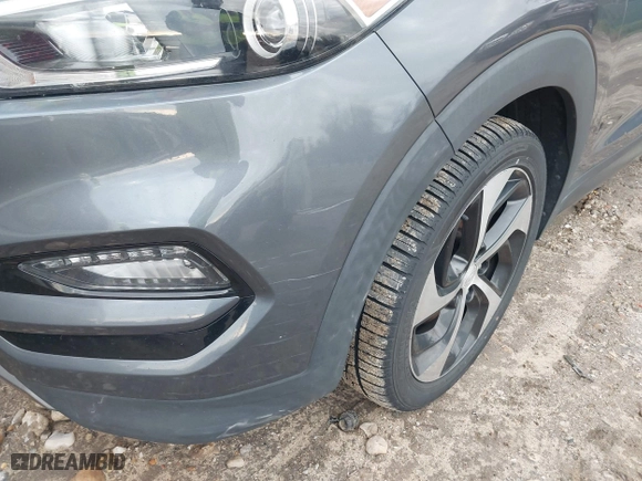 2016 Hyundai Tucson Limited with VIN KM8J3CA27GU088248, listed as a IAAI auction lot 42033882 with 102,112 mi miles. Bid and sale history available at carsss.com. Image 6.