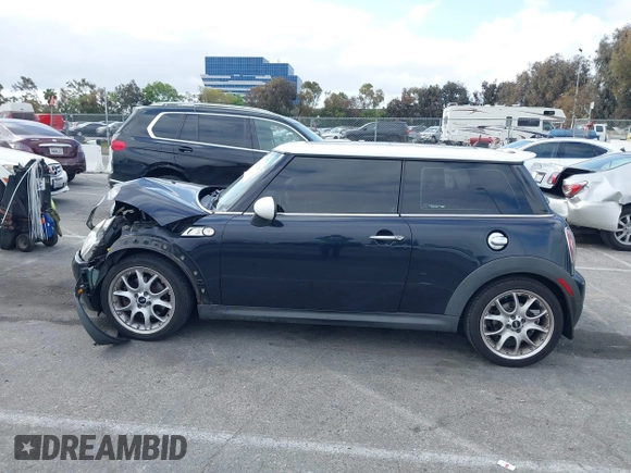 2007 MINI Hardtop S with VIN WMWMF73557TT80376, listed as a IAAI auction lot 42067228 with 174,262 mi miles and . Bid and sale history available at DreamBid. Image 14.