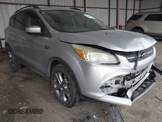2015 Ford Escape SE with VIN 1FMCU9G96FUA69556, listed as a IAAI auction lot 41446920 with 102,479 mi miles. Bid and sale history available at carsss.com. Image 1.