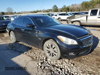 2012 Infiniti M Hybrid with VIN JN1EY1AP8CM910933, listed as a Copart auction lot 46451185 with 157,049 mi miles and Salvage title. Bid and sale history available at DreamBid. Image 4.
