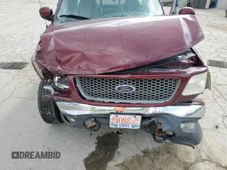 1999 Ford F-150 with VIN 1FTZF1823XNB69430, listed as a Copart auction lot 60218645 with Not provided miles and Salvage title. Bid and sale history available at DreamBid. Image 11.